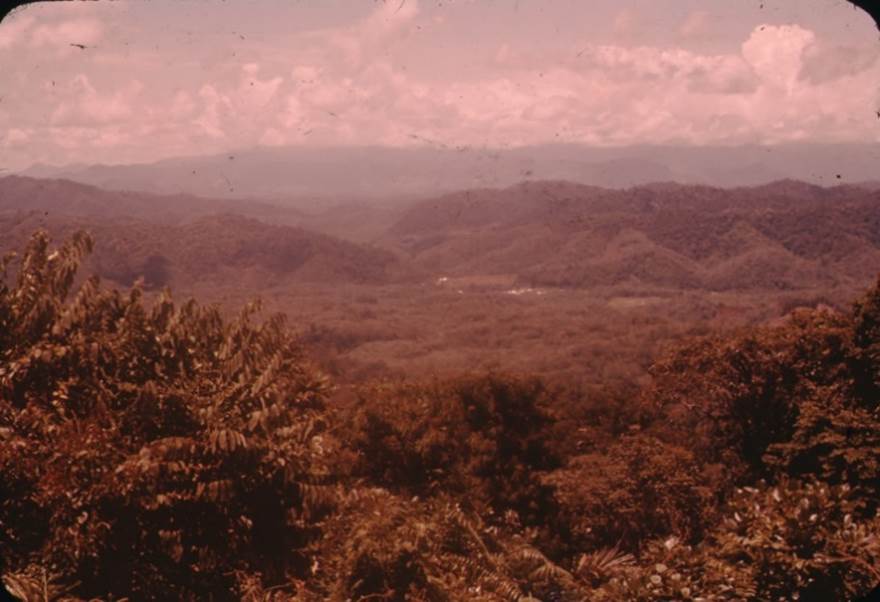 A picture containing outdoor, mountain, sky, grass
Description automatically generated